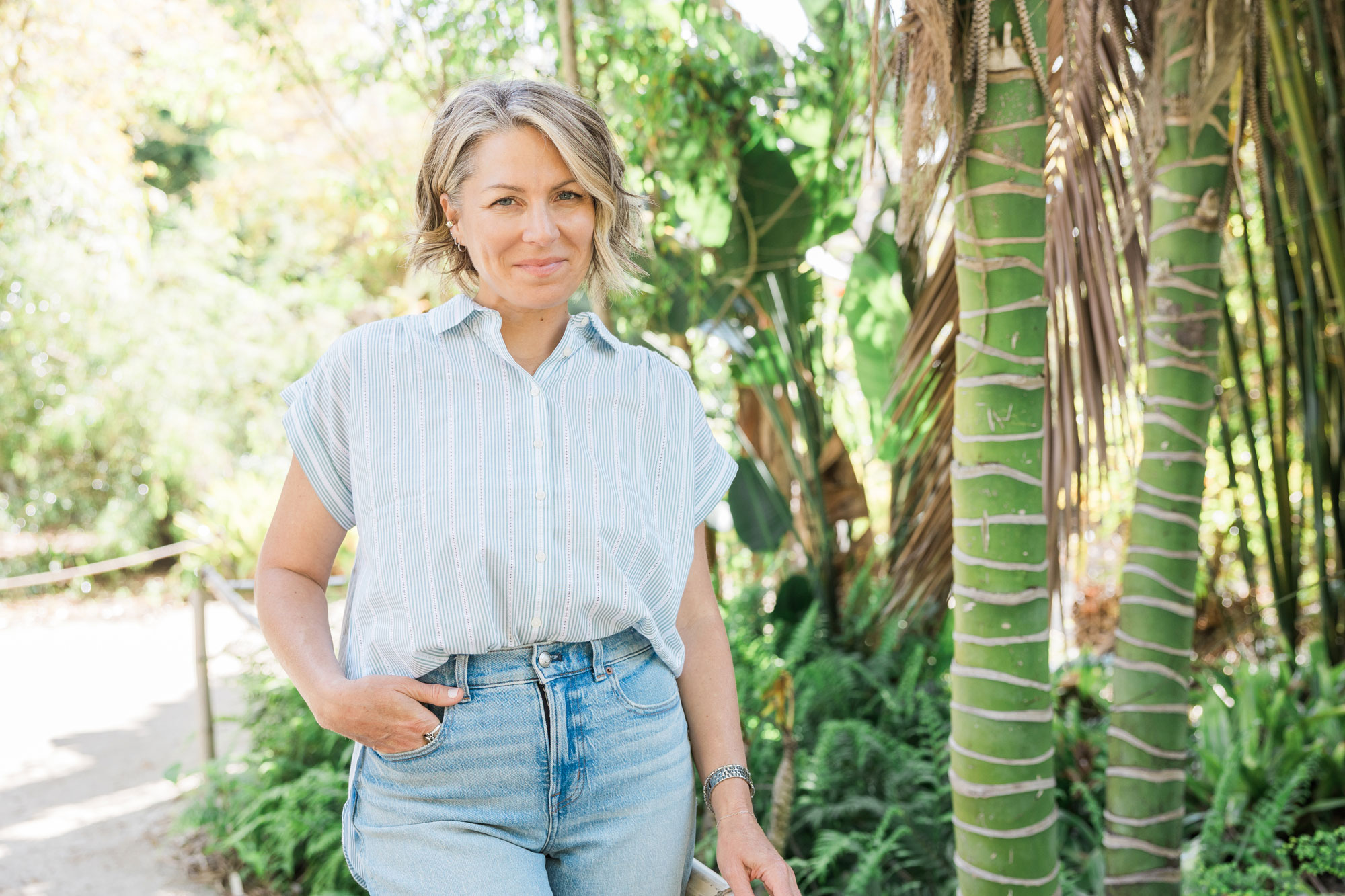 Kikki Avila standing in a garden